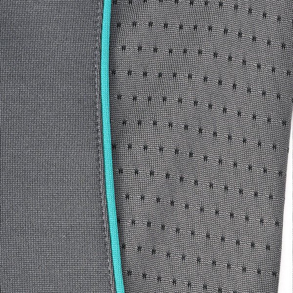 Charcoal textured polo shirt with turquoise contrast piping detail along placket and visible stitching