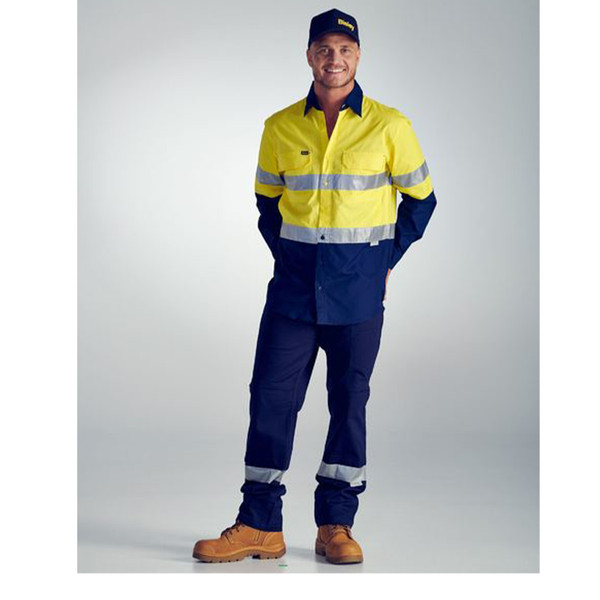Yellow and navy hi-vis ripstop shirt with reflective tape and contrast sleeves on model
