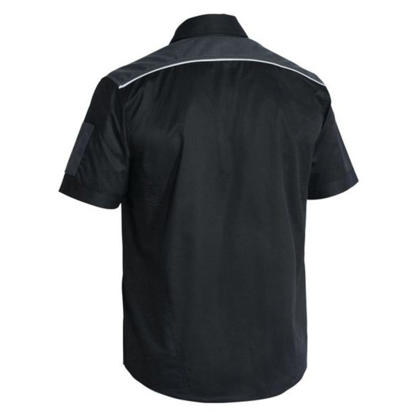 Black short sleeve work shirt with white contrast piping across upper back and shoulders