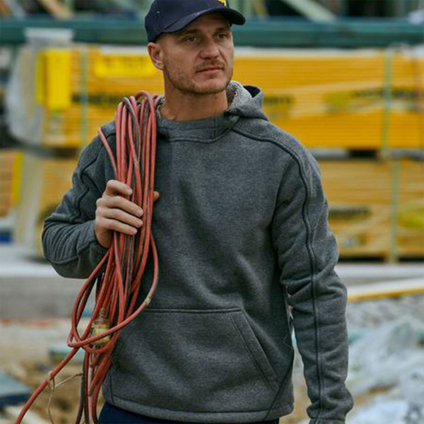 Charcoal marle fleece hoodie with kangaroo pocket and adjustable hood worn by tradesperson