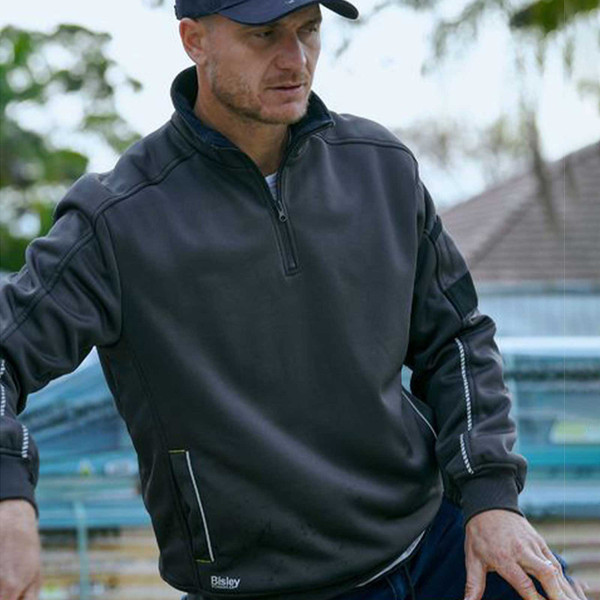 Charcoal fleece pullover with quarter zip, contrast panels on shoulders and sleeves, ribbed cuffs and hem