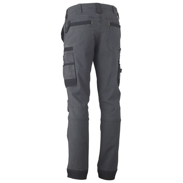 Charcoal grey women's cargo work pants rear view, black contrast pockets, holster and knee pad panels