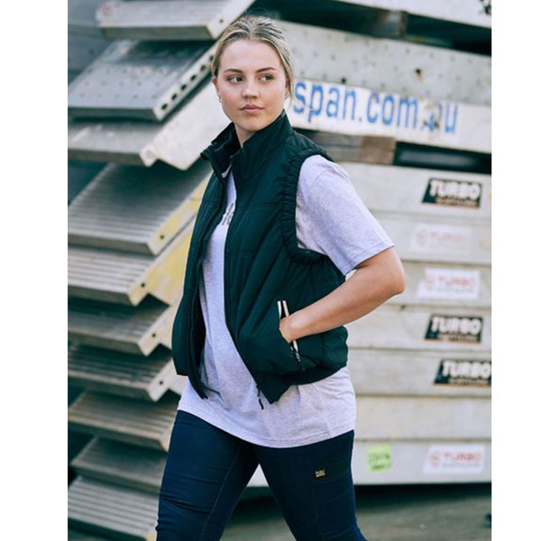 Navy puffer vest with grey marle tee showing contrast collar and zippered pockets