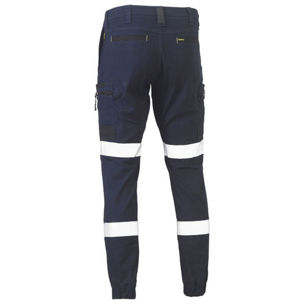 Navy cargo pants with white reflective tape, multiple cargo pockets and elasticated cuffs, rear view