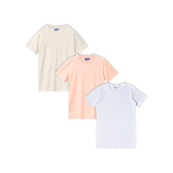 Three crew neck t-shirts in natural cream, soft pink and white with short sleeves laid flat in overlapping arrangement