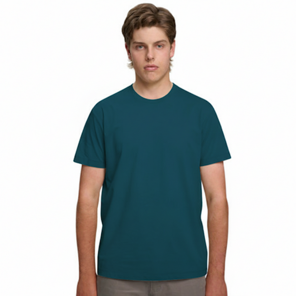 A male model with light brown hair wearing a plain atlantic Soho Men's Premium New Tech Cotton Face T-shirt, standing against a white background.