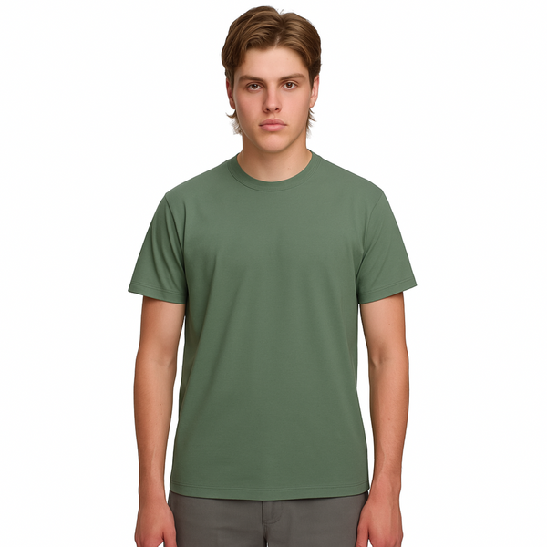 A male model with light brown hair wearing a plain mineral green Soho Men's Premium New Tech Cotton Face T-shirt, standing against a white background.