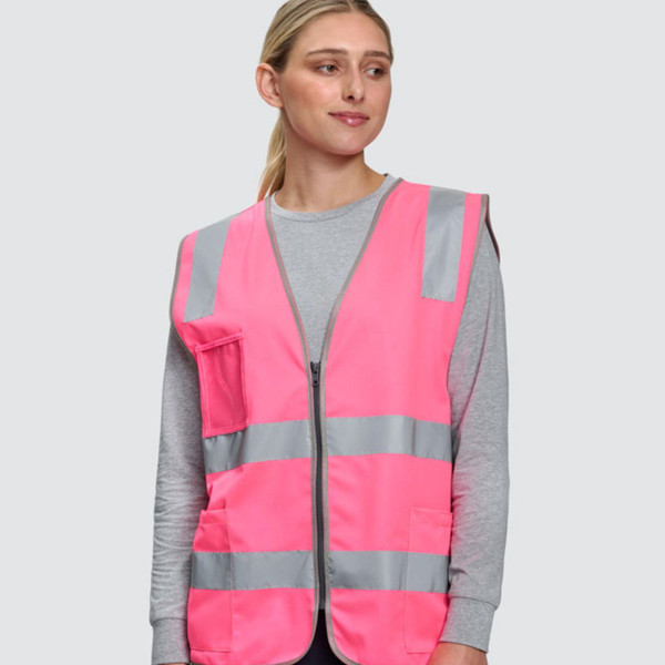 High-visibility pink safety vest with reflective silver stripes, front zipper, chest pocket and utility pockets