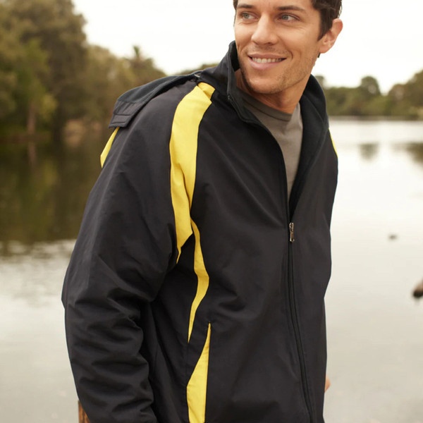 Black polar fleece jacket with bright yellow contrast panels and full-length zip worn by smiling man outdoors