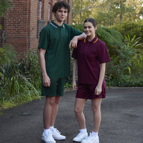 Forest green mesh shorts with contrast gold tipping on maroon polo dress styled as sportswear uniform