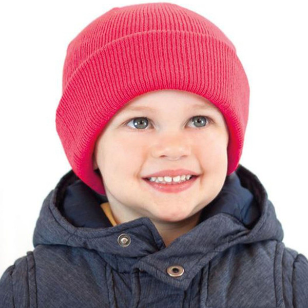 Hot pink ribbed knit cuffed beanie with folded brim on child model
