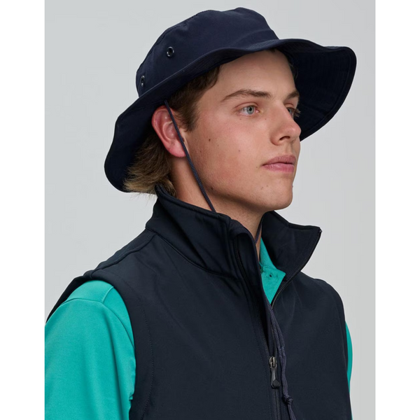 UMINA poly/cotton surf hat with UPF 50+ sun protection, featuring a soft brim, large eyelets, and a breakaway chin strap and toggle, perfect for beach and sun wear.