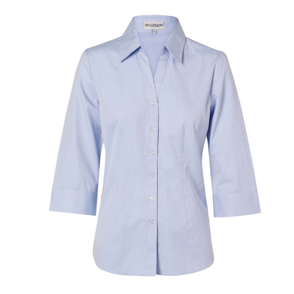 Light blue chambray women's shirt with collar, three-quarter sleeves and button-front closure