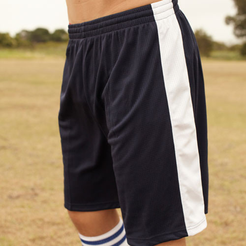 Navy sports shorts with white side panels and elasticated waistband worn outdoors