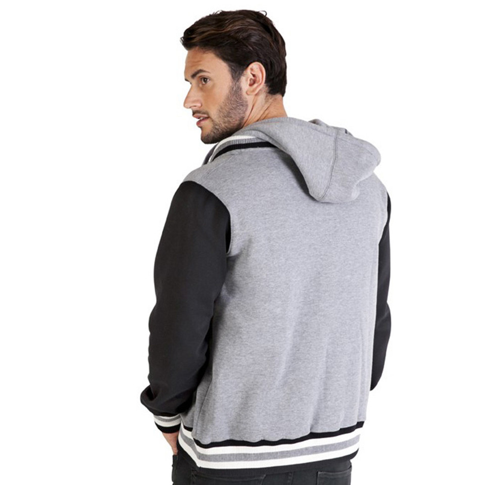 Grey marle body with black sleeves varsity jacket featuring hood and white striped ribbing shown from back