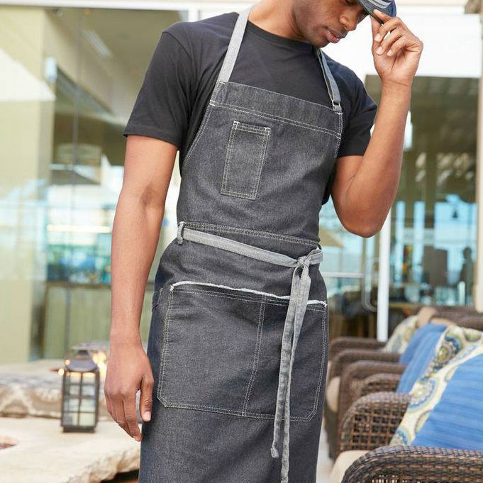 Charcoal denim waist apron with chest pocket, grey contrast stitching and adjustable neck straps