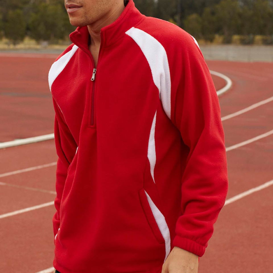 Red half-zip pullover with white contrast panels on shoulders and sides, featuring stand collar and front pockets