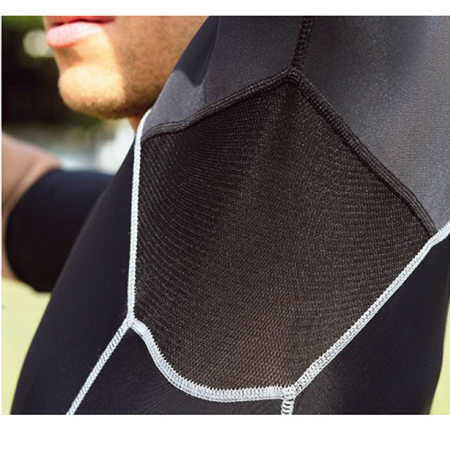 Black compression tee with white contrast stitching and textured fabric panel detail