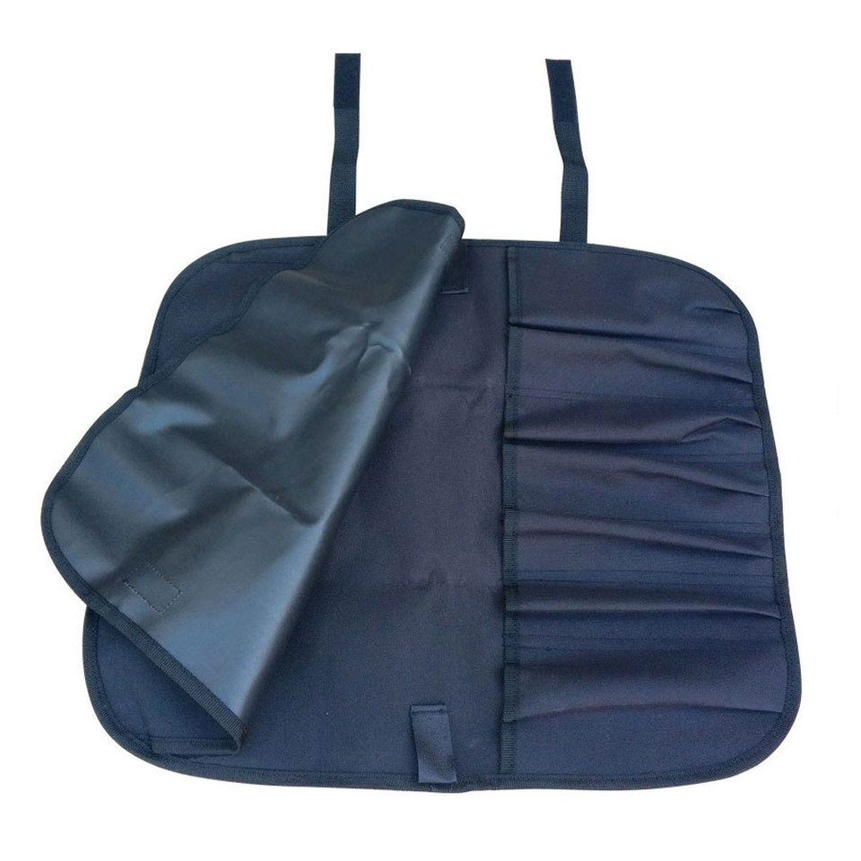 Black knife wrap bag with seven vertical pockets and adjustable straps shown open with rolled section