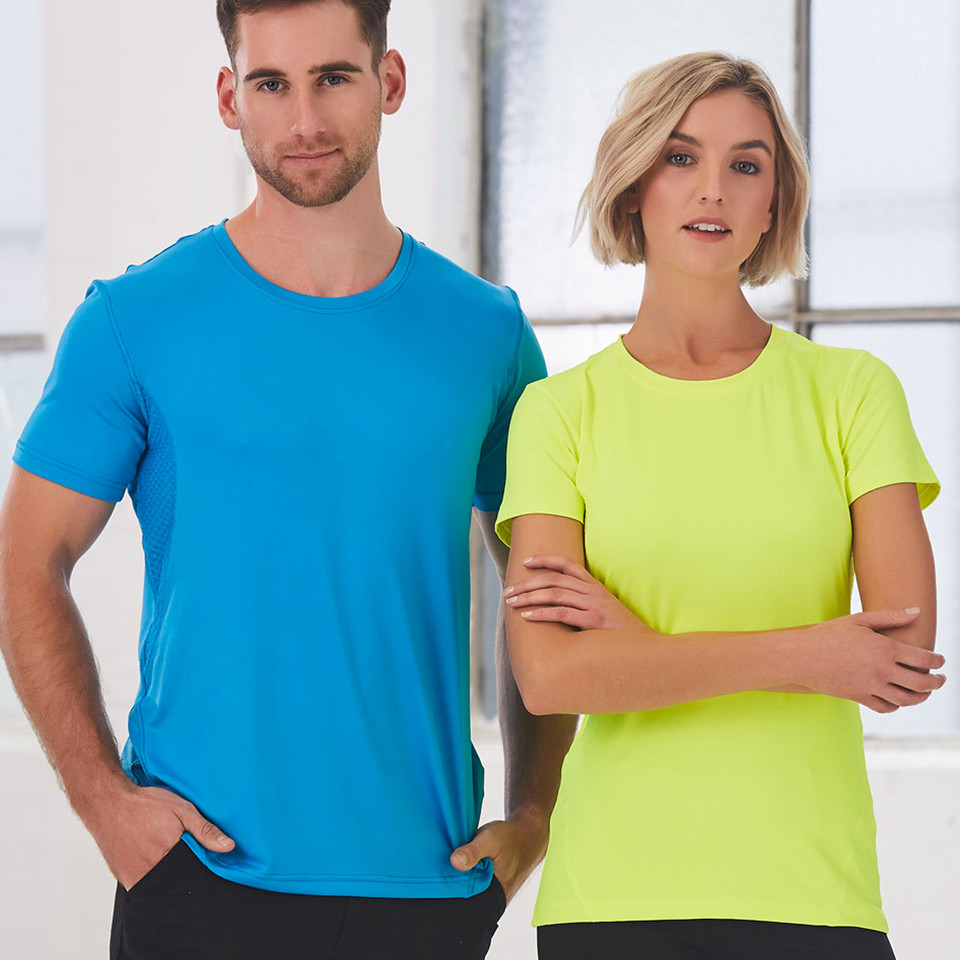 Sapphire blue sports tee on model with crew neck and short sleeves in moisture-wicking fabric