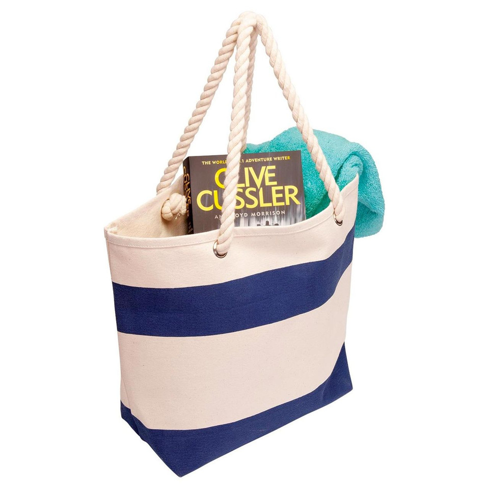 Natural and navy striped canvas tote bag with rope handles holding book and turquoise towel