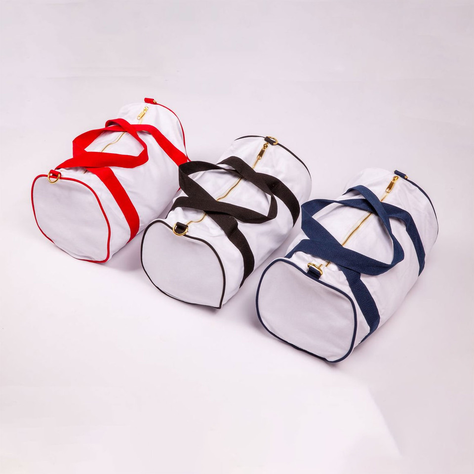 White canvas mini sports bags with red, black, and navy contrast handles and trim displayed in row