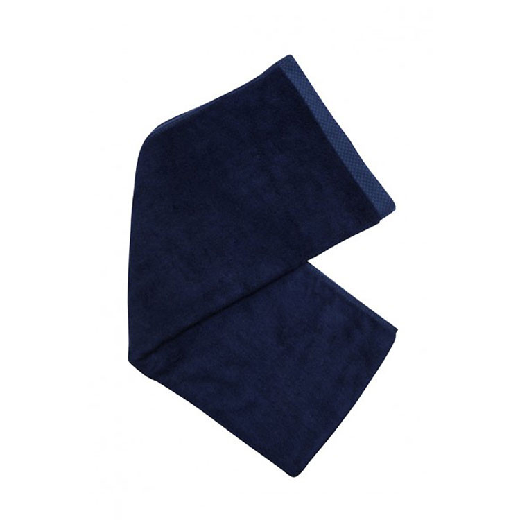 Navy blue bamboo cotton fitness towel folded to show soft terry texture and absorbent surface