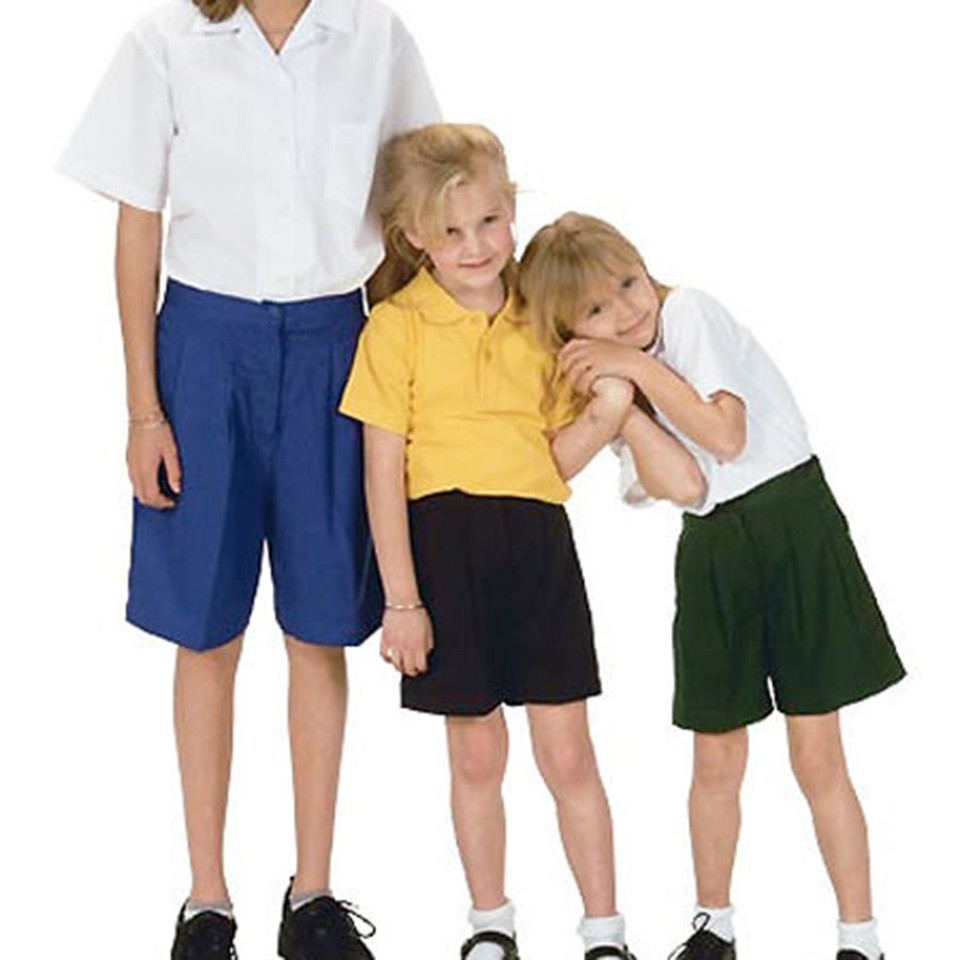 Girls tailored school shorts in navy, black and bottle green with pleated front panels