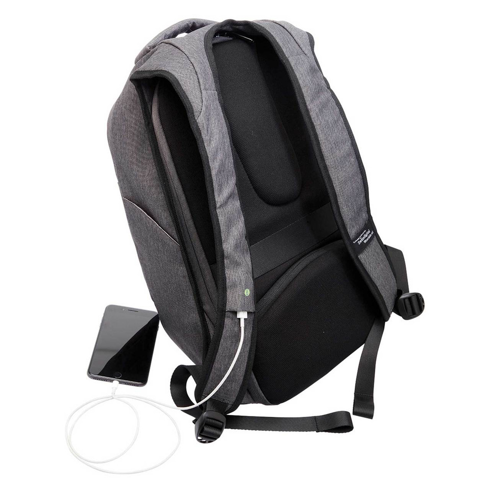 Rear view of grey marl anti-theft backpack showing padded back panel, USB charging port with connected phone and white cable