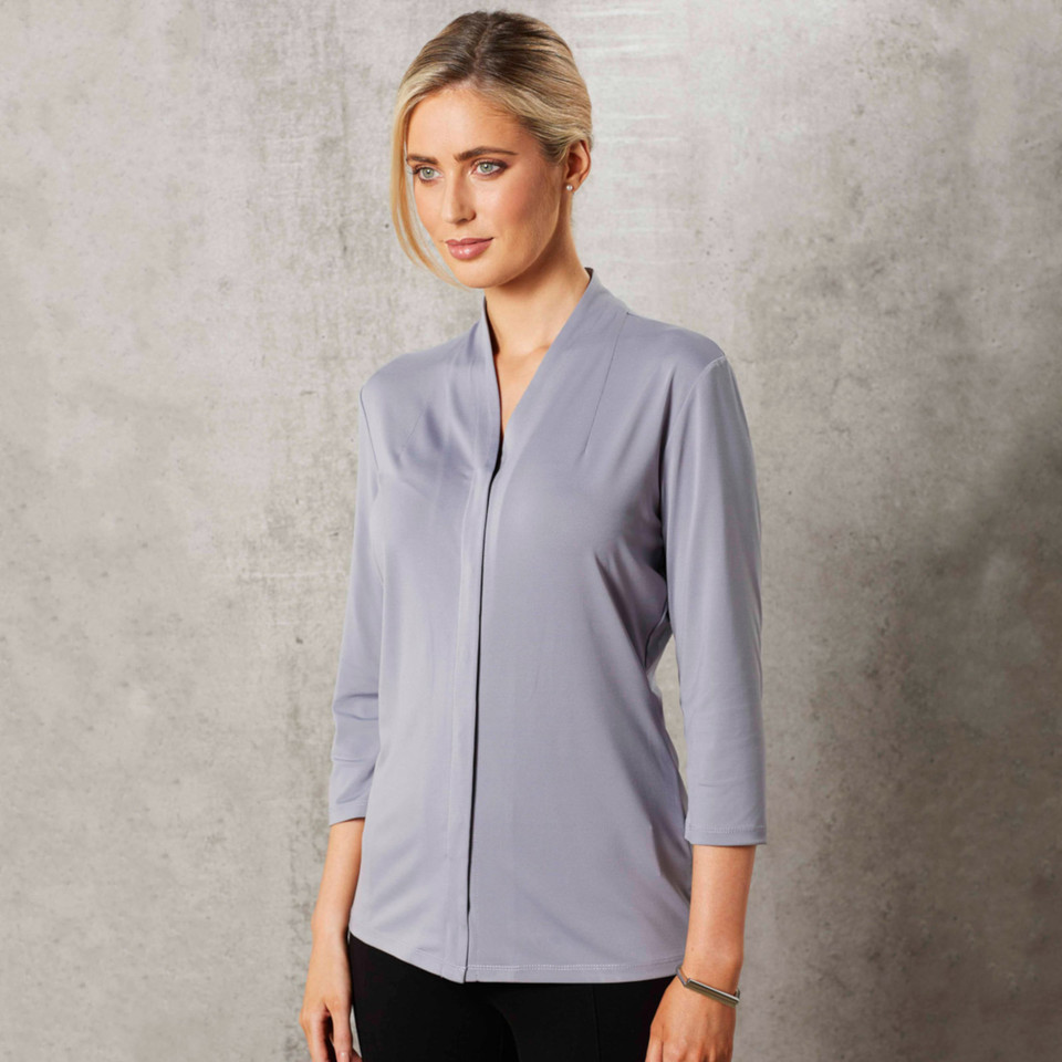 Light grey stretch knit top with three-quarter sleeves and mandarin collar with front panel detail