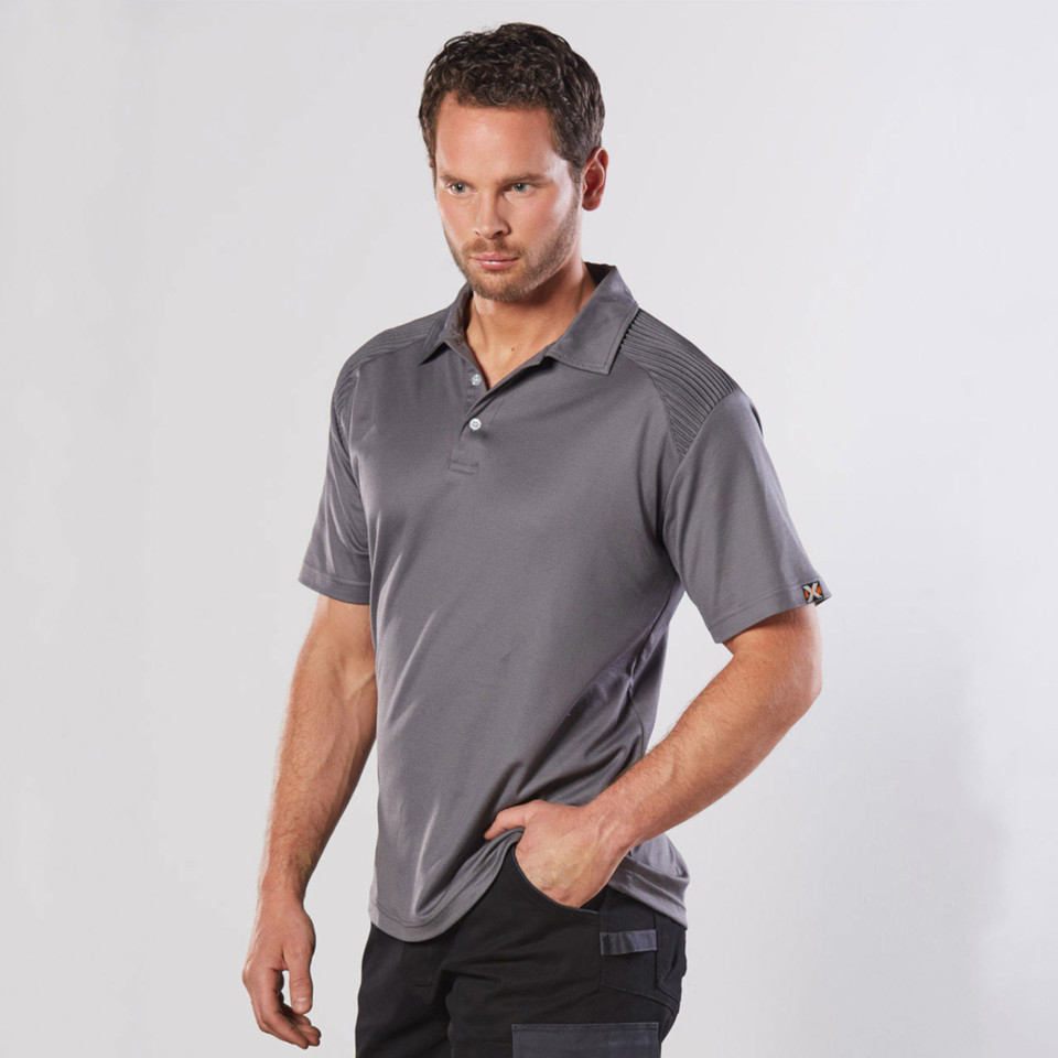 Man wearing charcoal grey short sleeve polo with contrast shoulder stitching panels and three-button placket