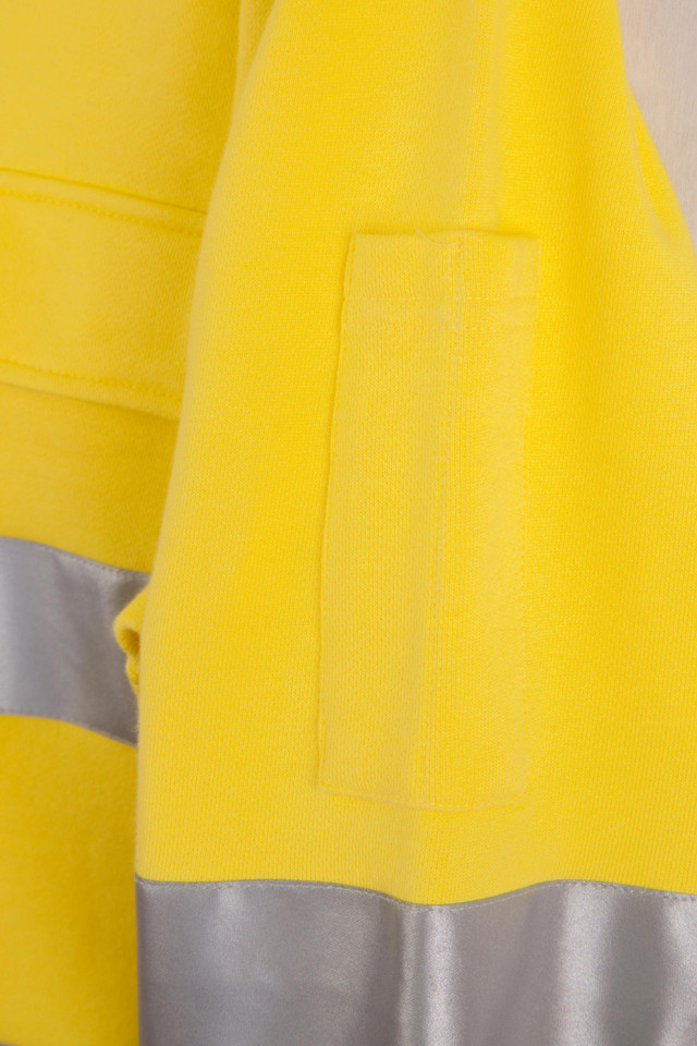 Bright yellow cotton fleece sweater with chest pocket and silver reflective tape detail