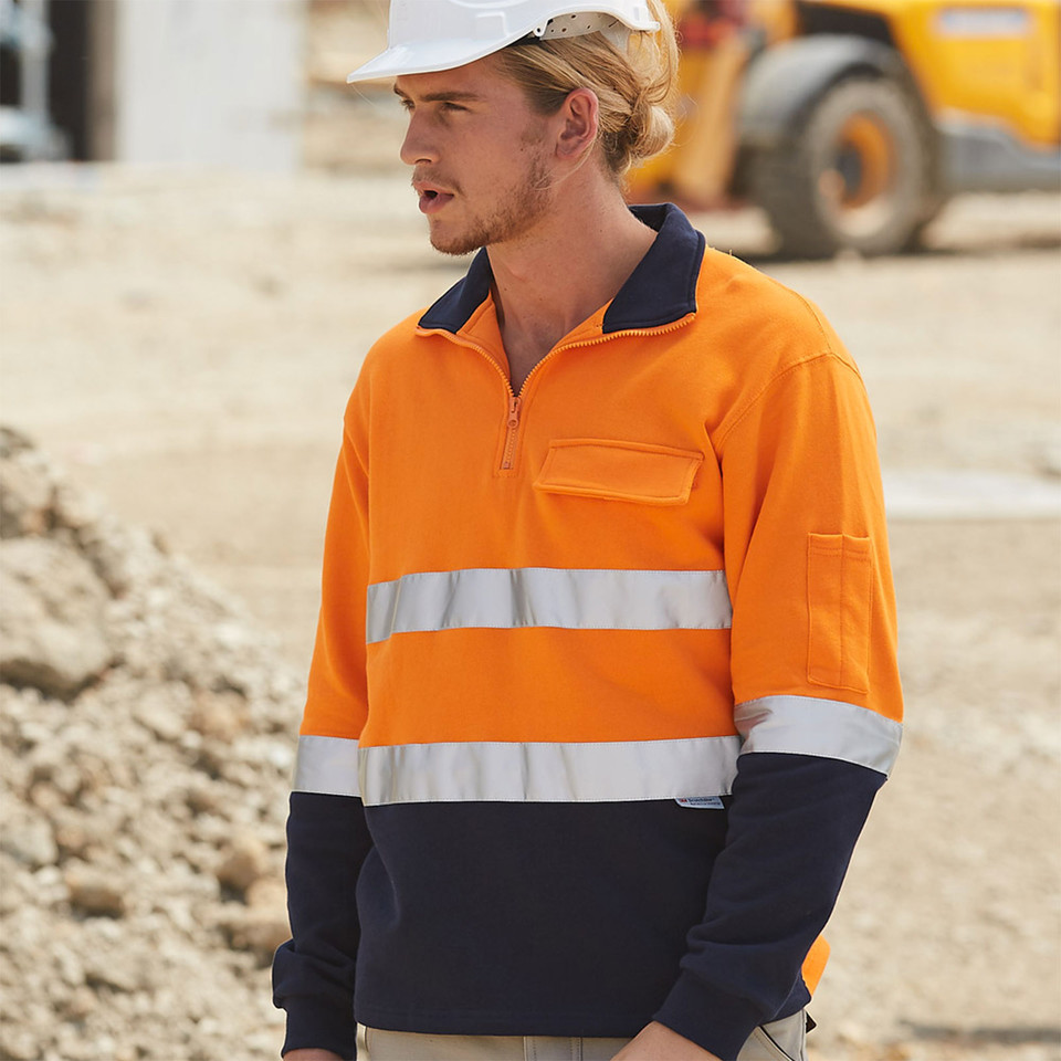Hi-vis fleece sweater in orange and navy with silver reflective tape, chest pocket, and contrast collar