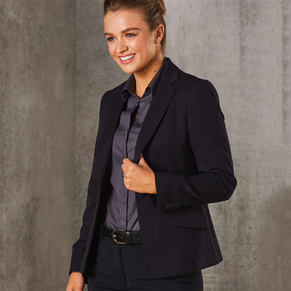 Navy stretch cropped blazer with notched lapels and single-button closure worn over charcoal blouse