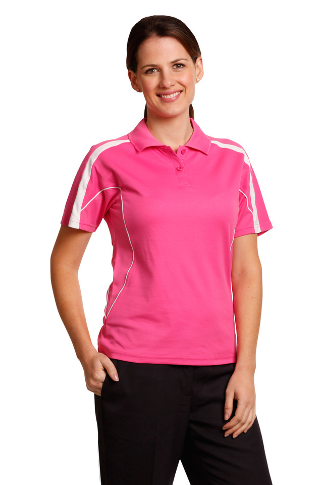 Woman wearing hot pink short-sleeve polo with white contrast side panels and piping detail