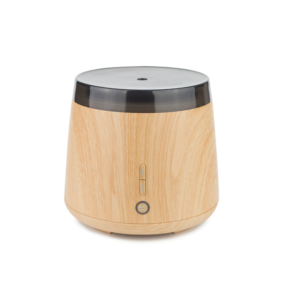 Light oak wood-finish ultrasonic diffuser with dark grey metallic top and minimalist control buttons
