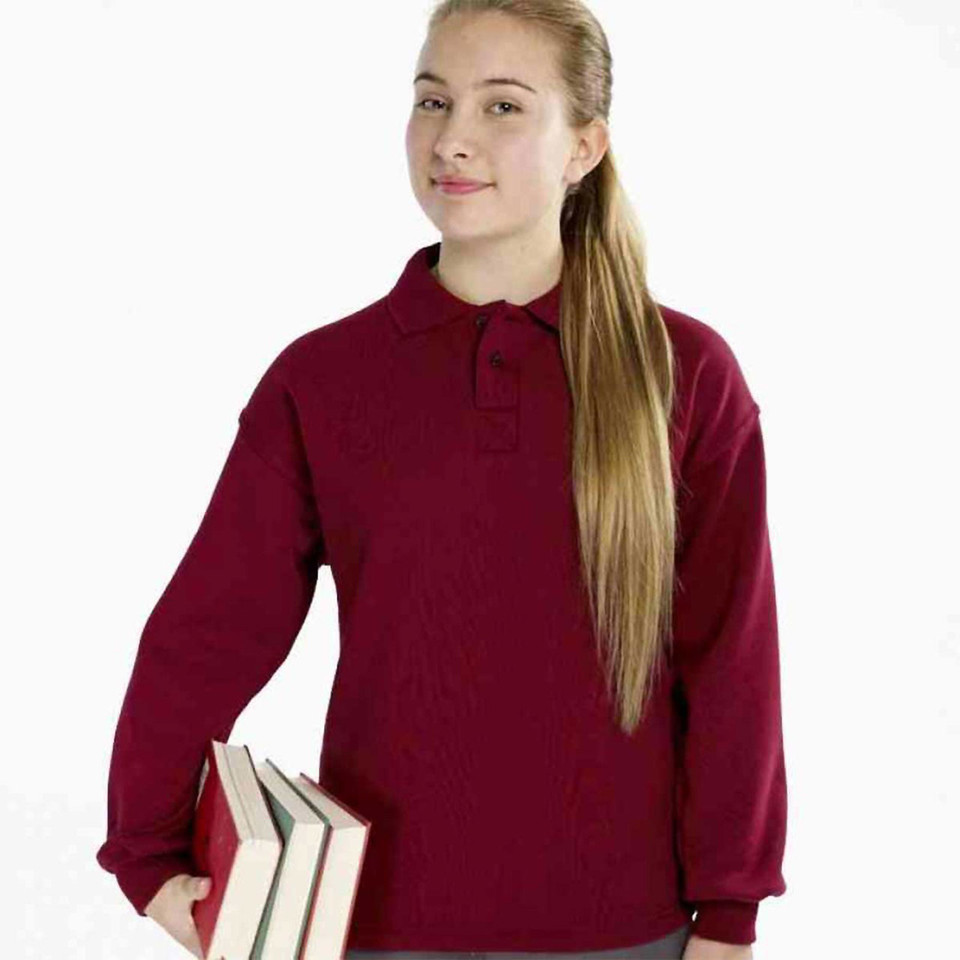 Young girl holding books wearing a crimson long sleeve fleece polo with ribbed cuffs and button collar