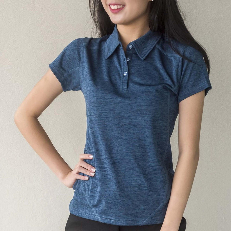 Woman wearing steel blue marl polo shirt with three-button placket and stitching detail at shoulder