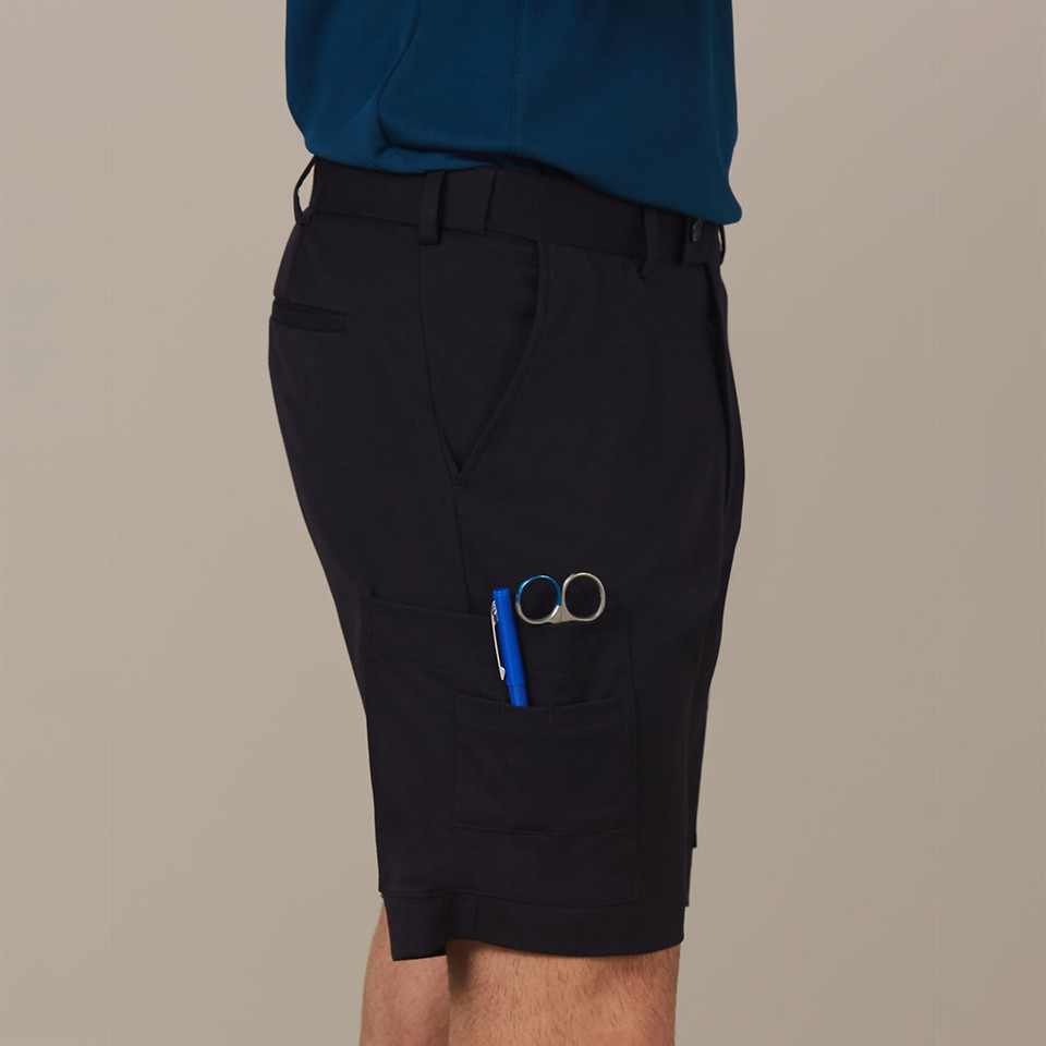 Black stretch cargo shorts with side cargo pocket and blue zipper detail, paired with teal polo shirt
