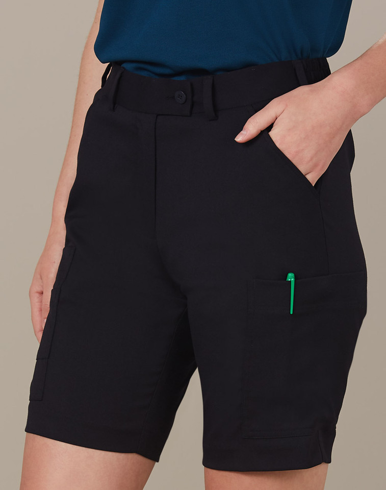 Black stretch cargo shorts with side pockets and belt loops, paired with teal blue top