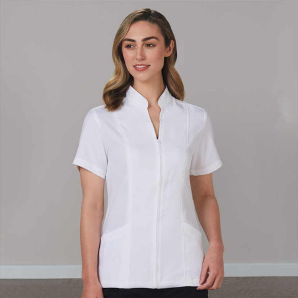 MAGGIE Women's Full Zip Front Short Sleeve Tunic, featuring a tailored professional fit, functional side pockets, and a durable full-length zipper for easy wear in medical and beauty environments.