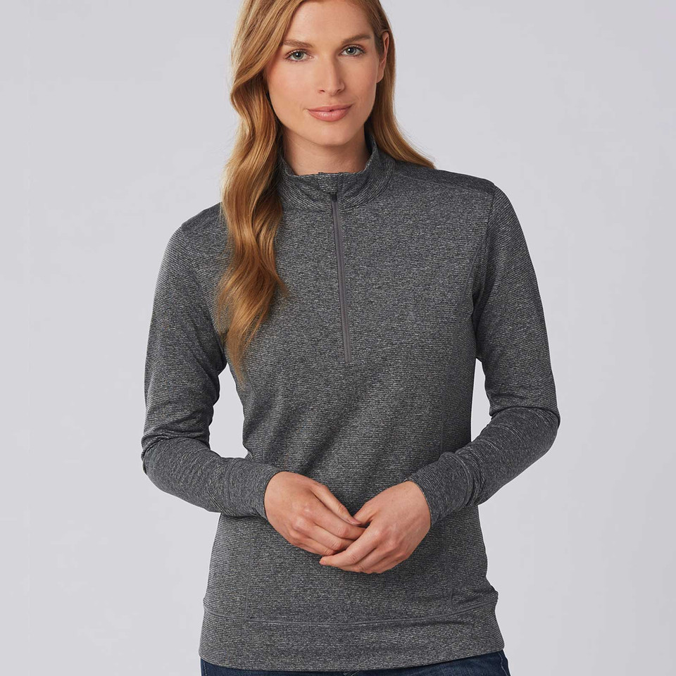 UNITED Ladies Half Zip Stretch Heather Sweater, a stylish women's performance pullover featuring a textured heathered fabric, flexible stretch for movement, and a versatile stand-up collar.