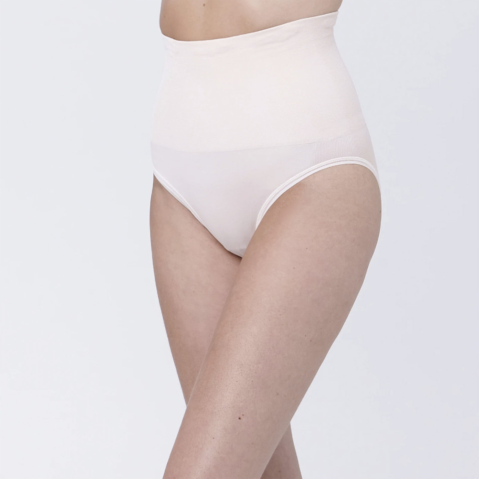 Pale pink high-waisted compression briefs with smooth supportive waistband panel
