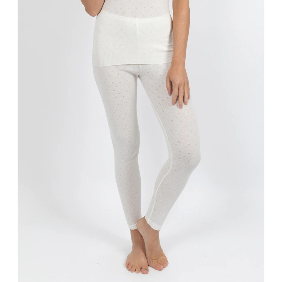 Model wearing oatmeal marle pointelle thermal leggings with wide waistband, full-length slim fit