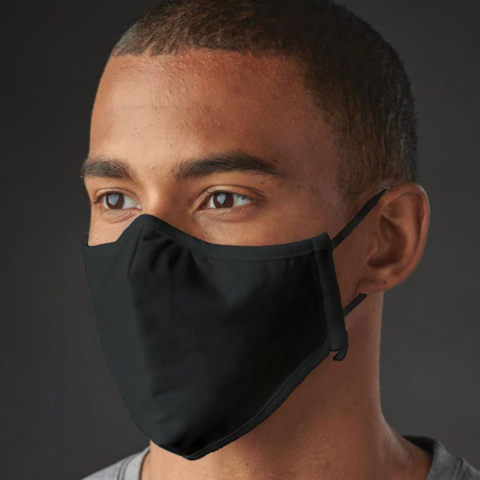 Black reusable face mask with adjustable ear loops and contoured fit shown on model