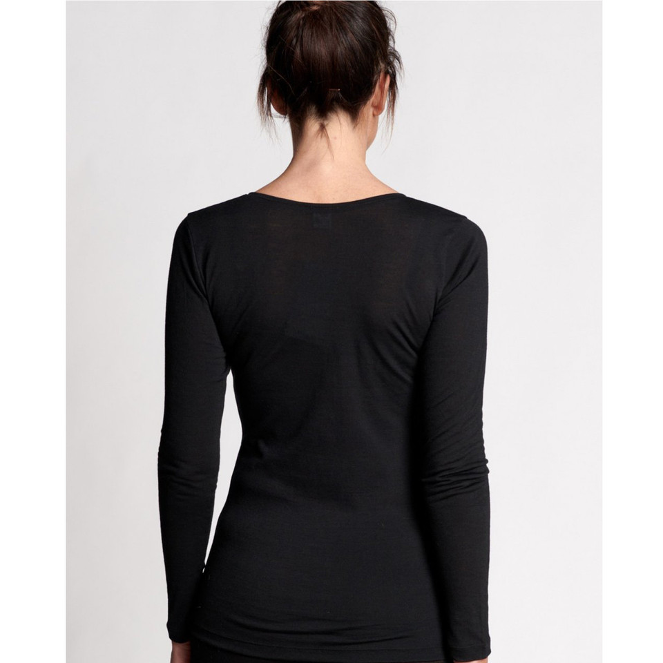 Back view of black long sleeve fitted women's tee with boat neckline and smooth fabric finish