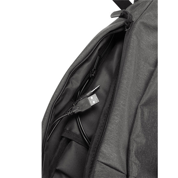 Charcoal heather backpack interior showing open front pocket with USB charging cable port access