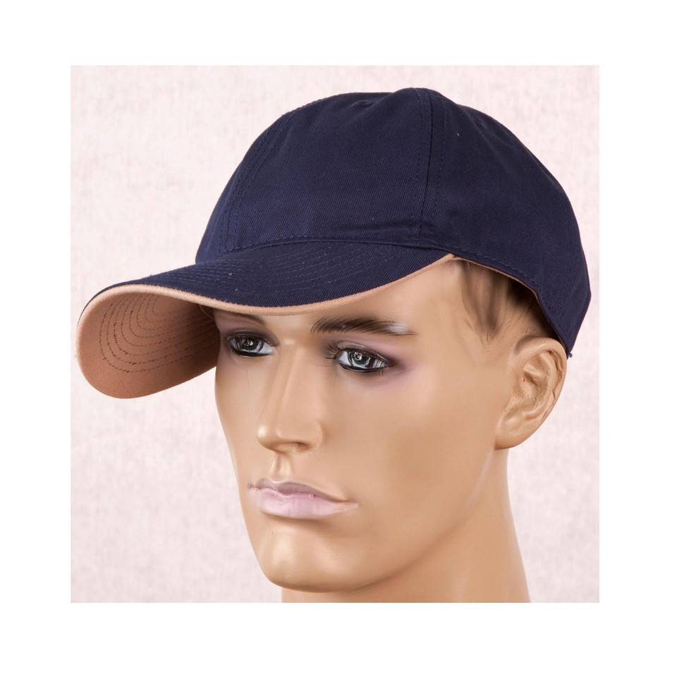 Navy blue six-panel cotton cap with contrast tan underpeak brim, worn on mannequin, smooth front panel