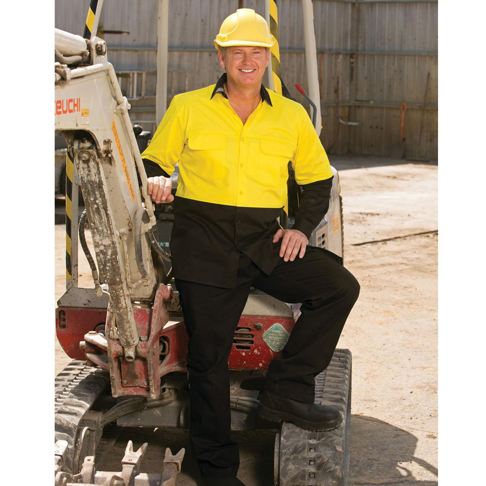 Hi-vis yellow work shirt with black contrast panels and long sleeves on construction worker