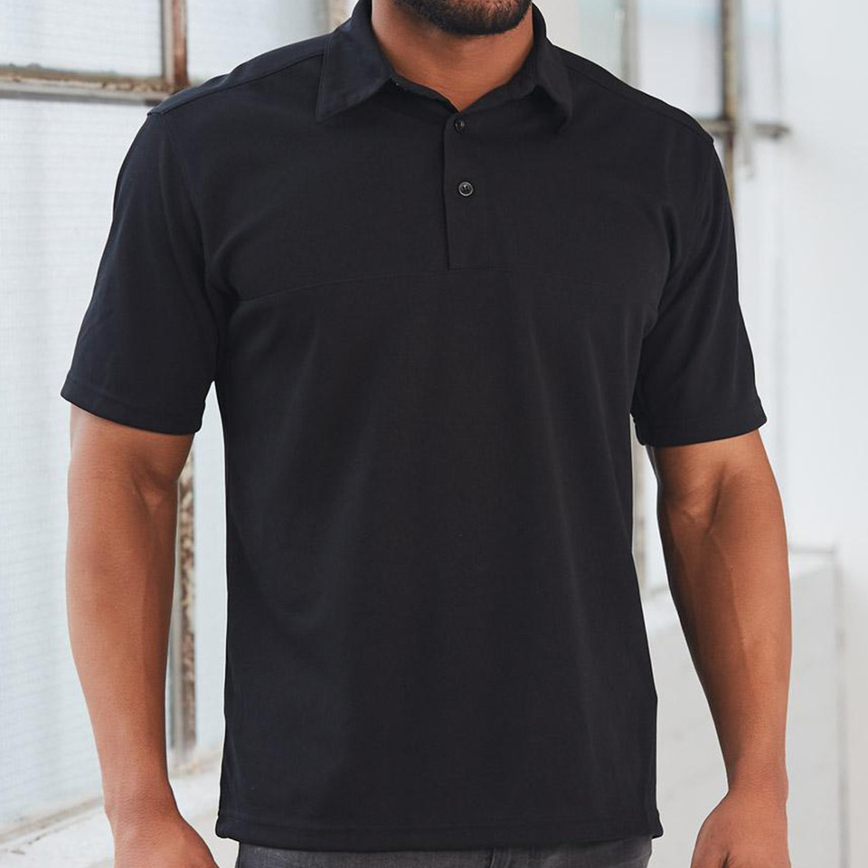 Man wearing a black short sleeve polo with two-button placket and smooth CoolDry mesh front panel
